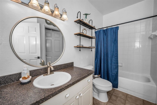 full bathroom featuring tile patterned floors, vanity, toilet, and shower / tub combo