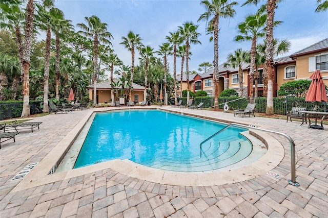 view of swimming pool featuring a patio