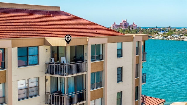 view of building exterior featuring a water view