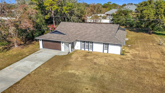 ranch-style house featuring a front yard