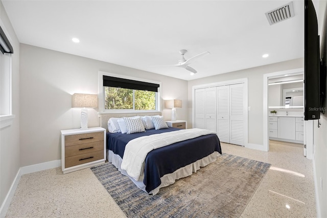 bedroom with connected bathroom, ceiling fan, and a closet