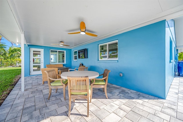 view of patio / terrace featuring ceiling fan