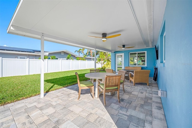 view of patio / terrace featuring ceiling fan