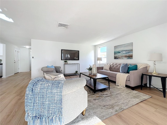 living room with hardwood / wood-style flooring