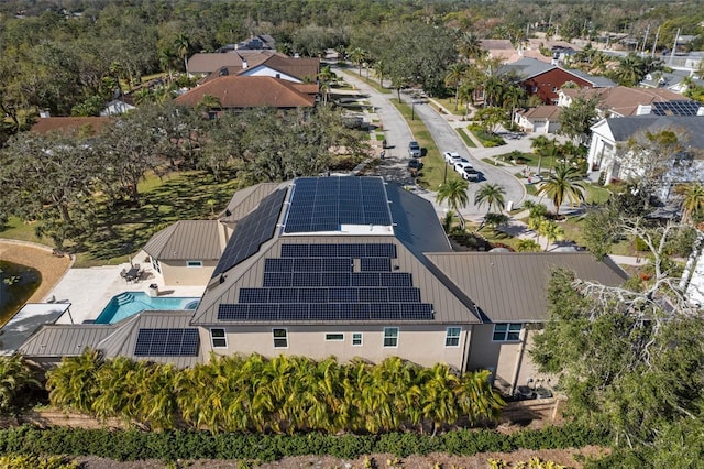 birds eye view of property with a residential view