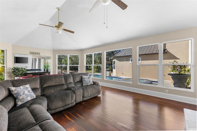 living room featuring lofted ceiling, ceiling fan, wood finished floors, visible vents, and baseboards