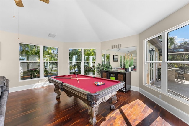 game room featuring plenty of natural light, wood-type flooring, visible vents, and vaulted ceiling