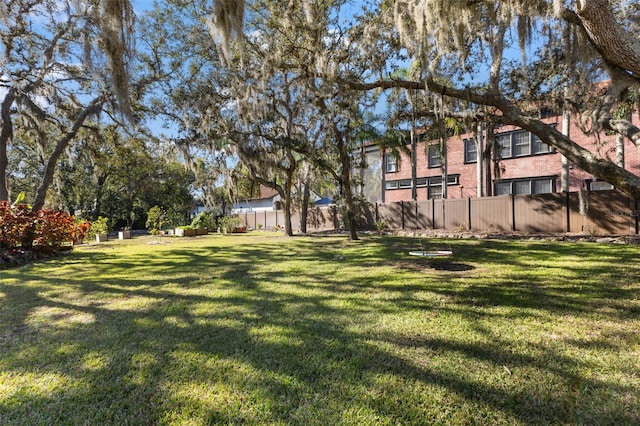 view of yard featuring fence