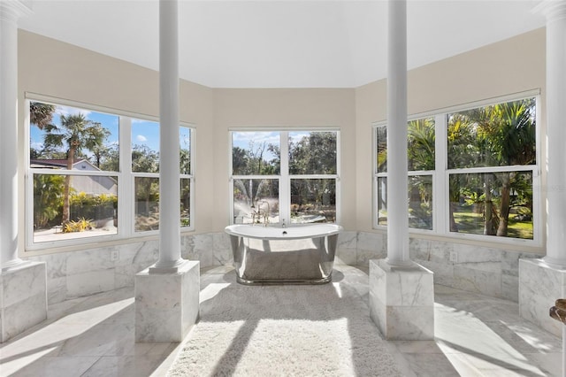 sunroom with ornate columns