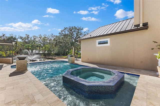 view of swimming pool featuring a pool with connected hot tub and a patio area