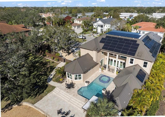 birds eye view of property with a residential view