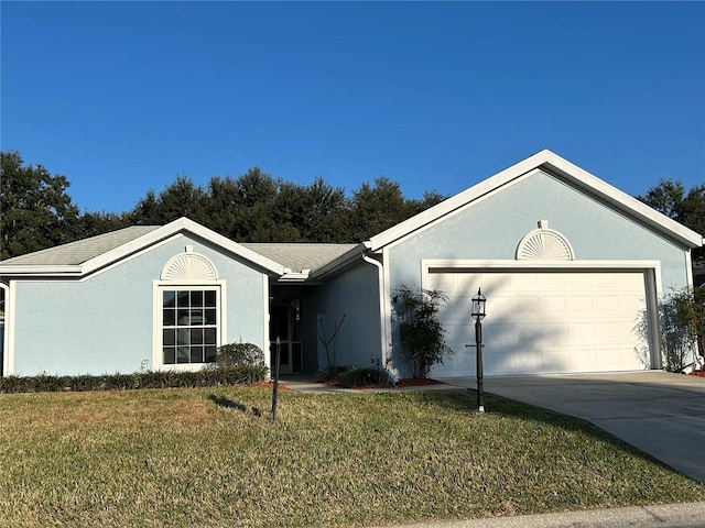 ranch-style house with a front lawn, a garage, driveway, and stucco siding