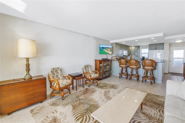 living room featuring light tile patterned floors