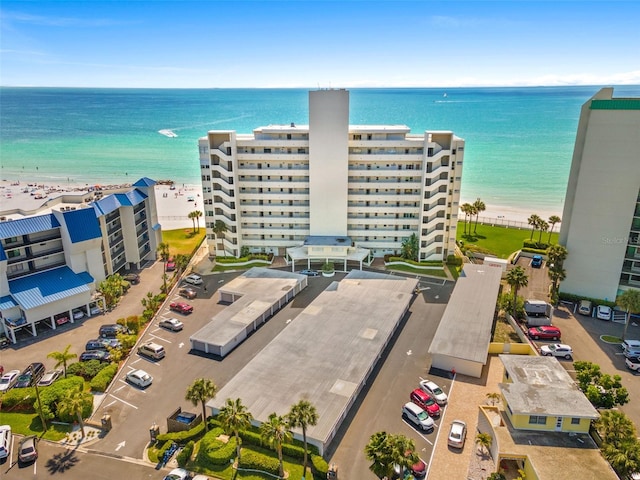 aerial view with a view of the beach and a water view