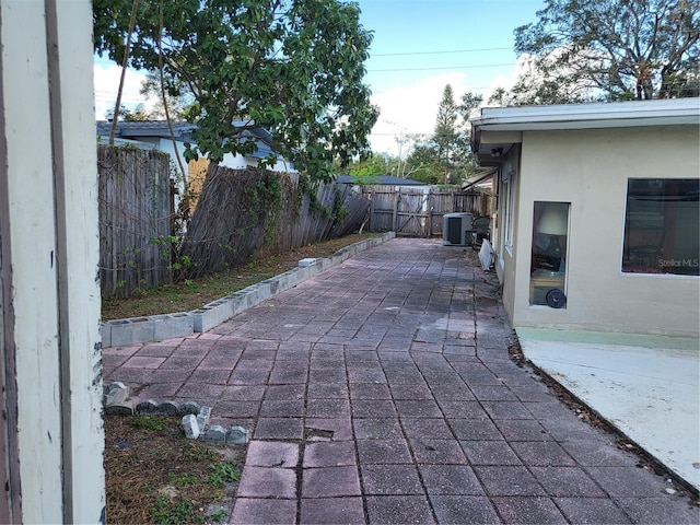 view of patio / terrace with central AC unit