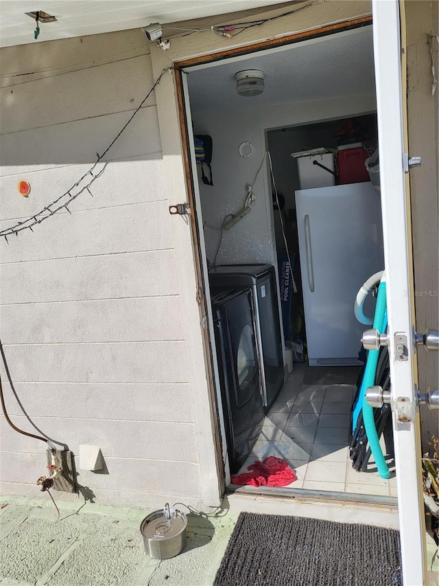 laundry area featuring separate washer and dryer