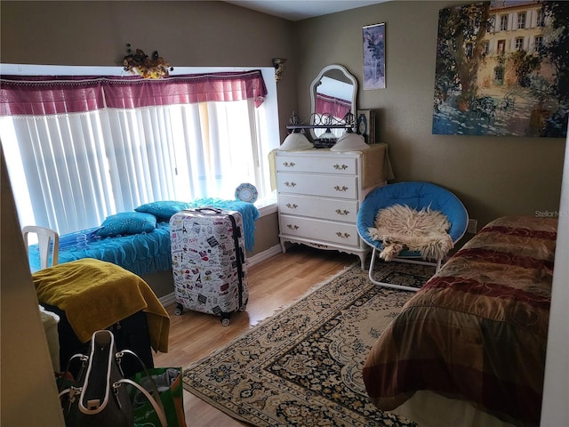 bedroom featuring light hardwood / wood-style flooring