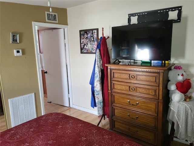 bedroom featuring light hardwood / wood-style flooring