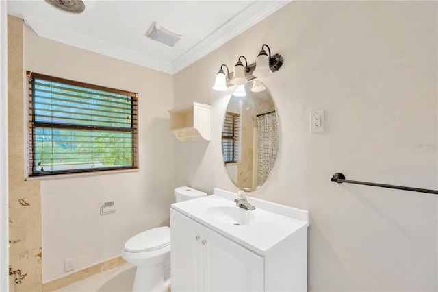 bathroom featuring tile patterned floors, vanity, toilet, and ornamental molding