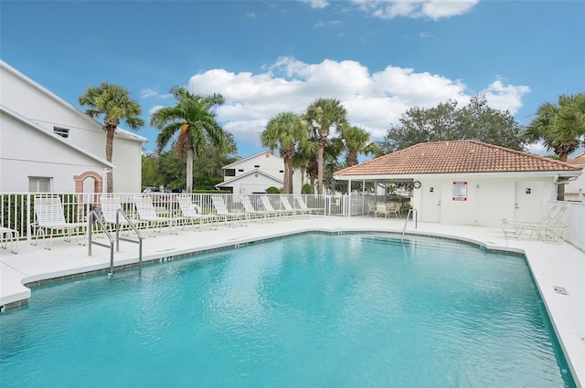 view of swimming pool featuring a patio