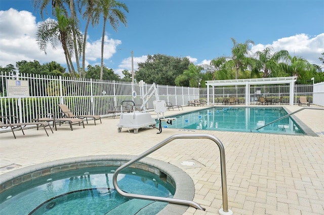 view of pool with a patio area and a community hot tub