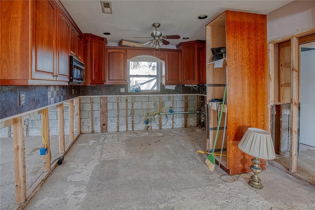 kitchen featuring ceiling fan