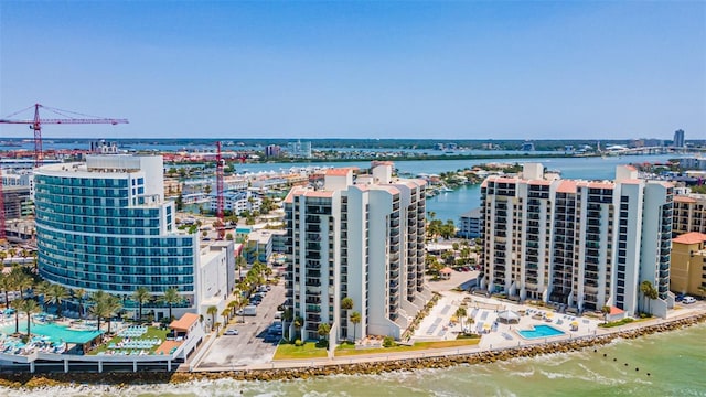 birds eye view of property with a water view