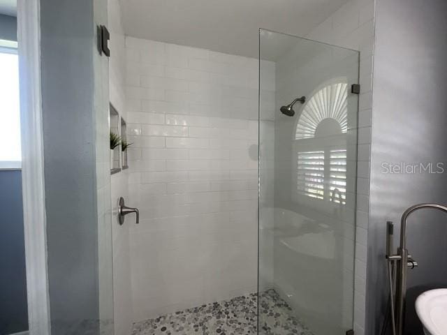 bathroom with a stall shower