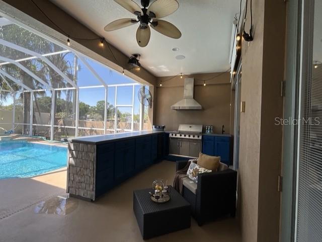 view of patio featuring an outdoor pool, ceiling fan, glass enclosure, and a grill
