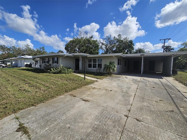 single story home with a carport and a front yard