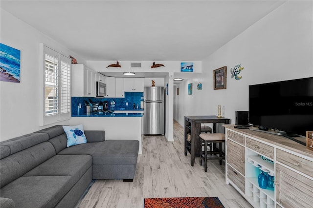 living room featuring light hardwood / wood-style floors