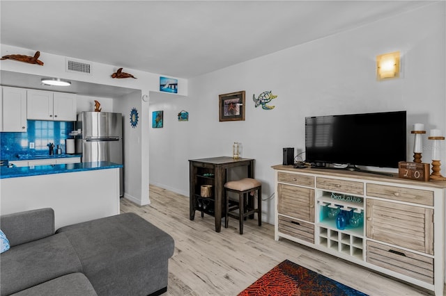 living room with light wood-type flooring