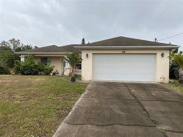 single story home with a garage and a front yard