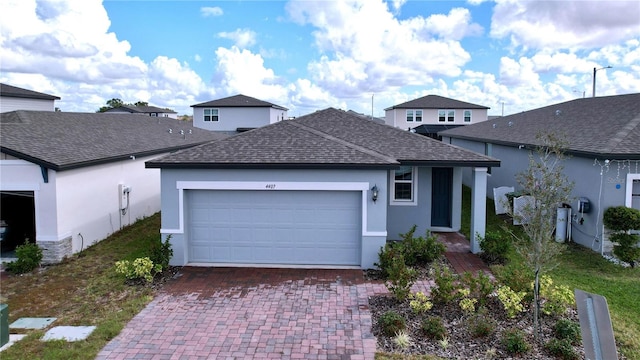 front of property featuring a garage