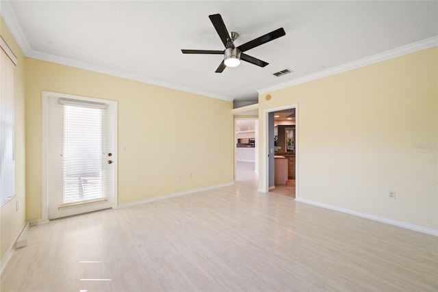 spare room featuring crown molding, ceiling fan, and light hardwood / wood-style flooring