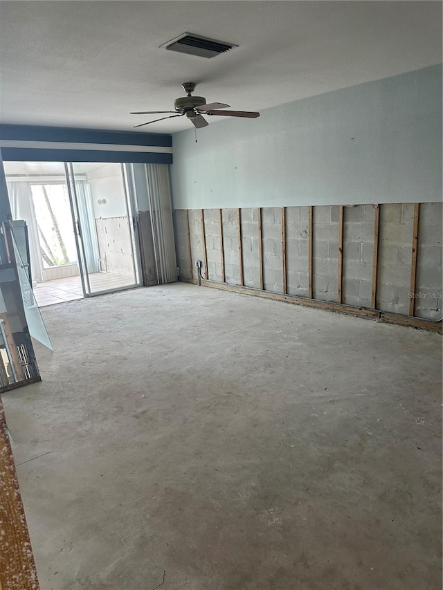 409 Boca Ciega Point Blvd S Unit 1008, Saint Petersburg, FL 33708 - spare room featuring unfinished concrete floors and a ceiling fan