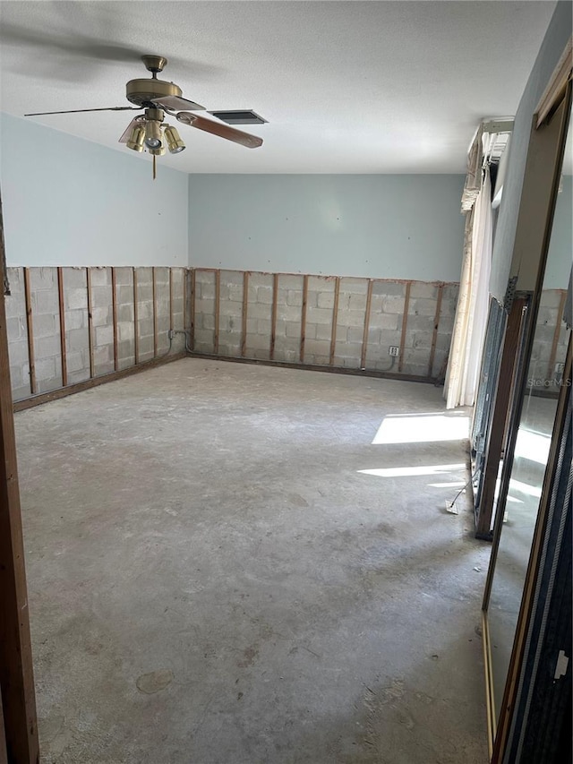 409 Boca Ciega Point Blvd S Unit 1008, Saint Petersburg, FL 33708 - empty room featuring concrete flooring and a ceiling fan