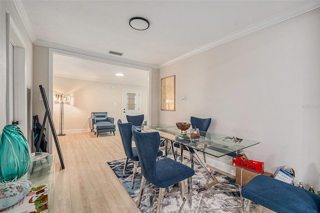 office space with hardwood / wood-style floors and ornamental molding