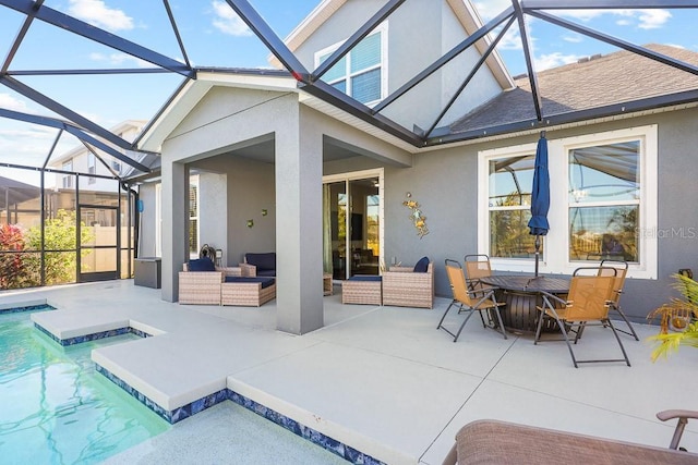 back of property with a patio and an outdoor hangout area