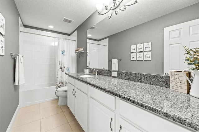 full bathroom featuring vanity, a textured ceiling, shower / bathtub combination with curtain, tile patterned flooring, and toilet