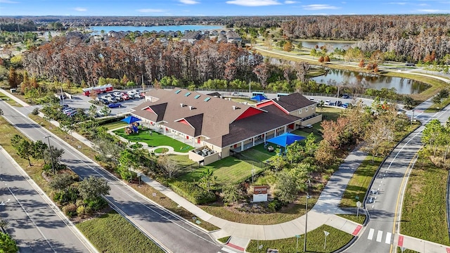 drone / aerial view with a water view