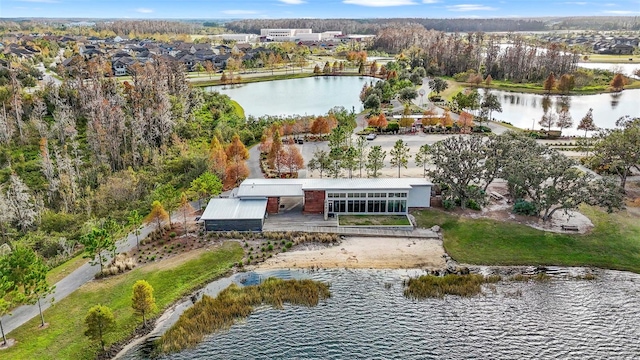 drone / aerial view with a water view