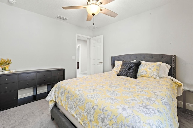 bedroom featuring visible vents, baseboards, and ceiling fan