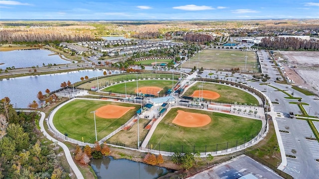 birds eye view of property featuring a water view