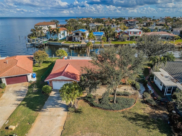 drone / aerial view with a water view