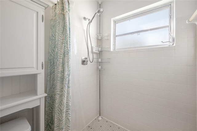 bathroom with curtained shower