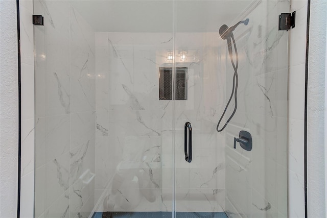 bathroom featuring an enclosed shower