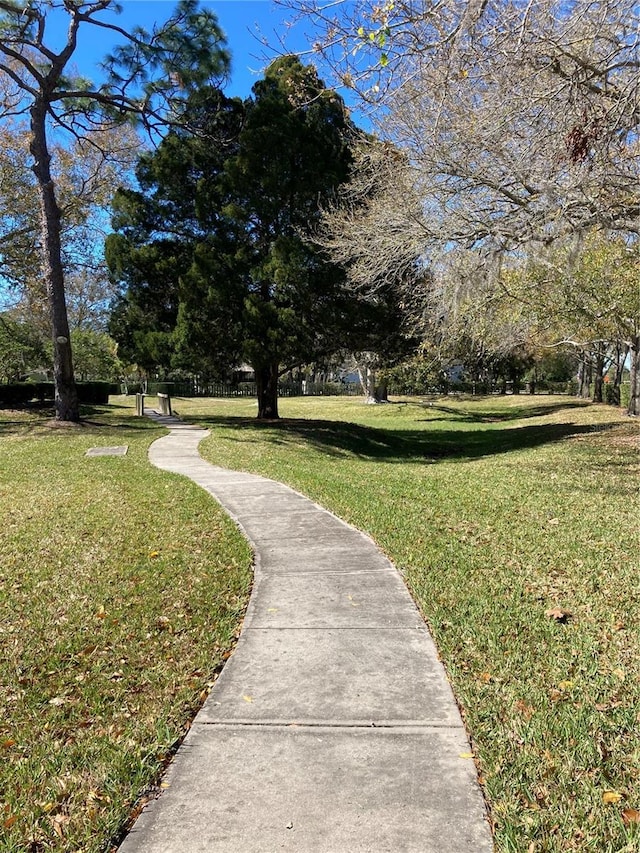 surrounding community featuring a lawn