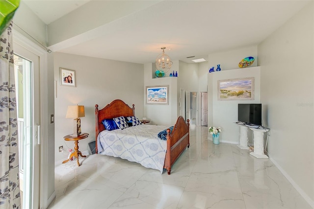 bedroom with a notable chandelier