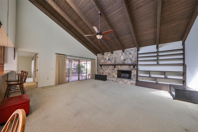 unfurnished living room featuring ceiling fan, high vaulted ceiling, a fireplace, carpet, and wood ceiling